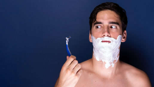 adult-male-with-shaving-cream-razor